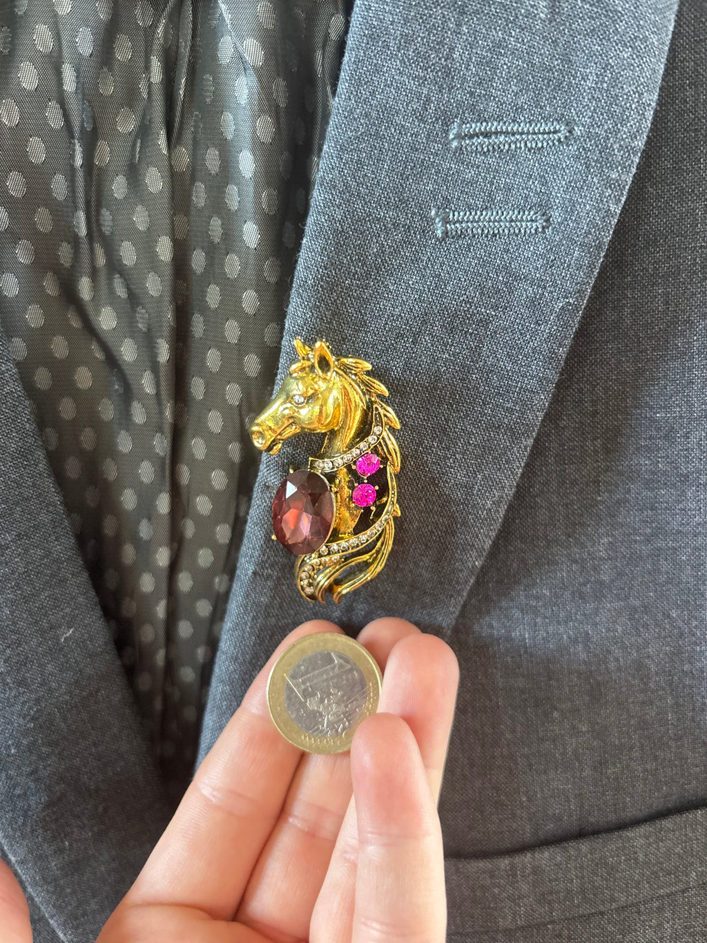 Gold tone horse brooch